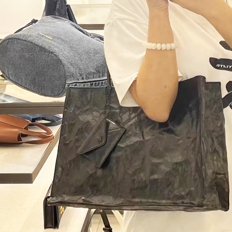 أكياس محفورة على ورق كرافت الك - مراجعة Luxury Bags Online وسعره