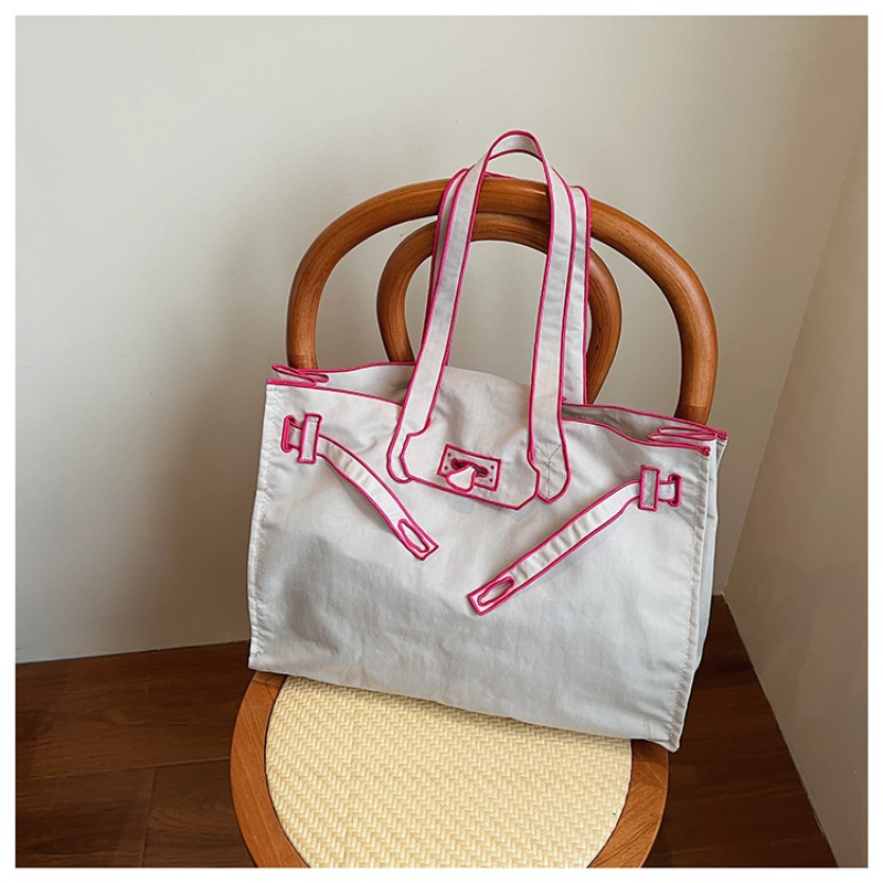 حقيبة كتف خفيفة الوزن من الناي - مراجعة Canvas Tote Designer وسعره